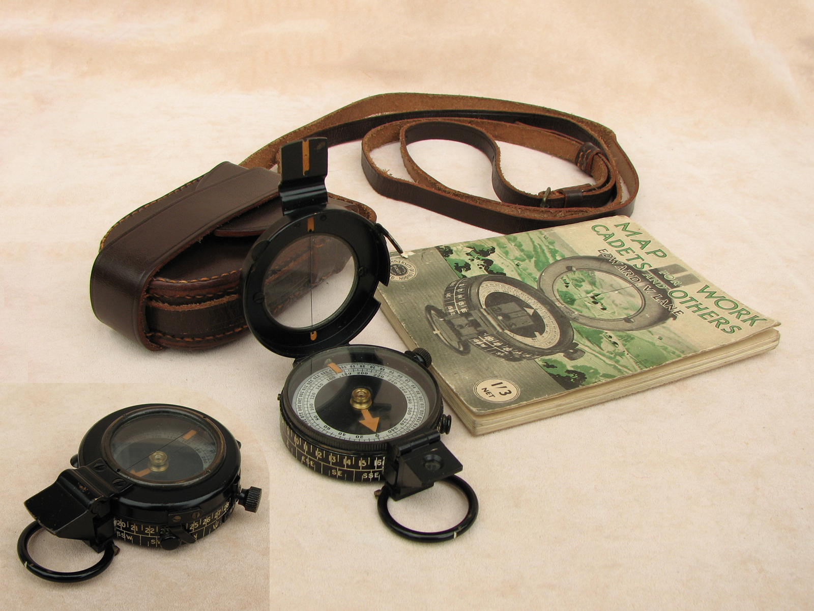 WW2 era MK IX prismatic marching compass with cadet handbook
